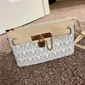 Nice woman crossbody bag white and cream in color/ never use like new